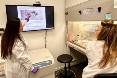 Researchers at CTMC reviewing results in a lab