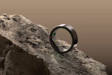 The Circular Slim Smart Ring, a small black rind with a sensor on the inner portion.