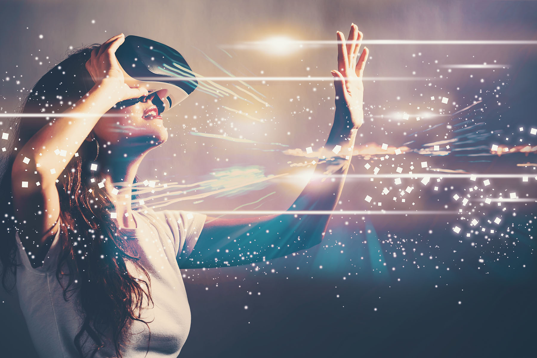 Women wearing VR glasses with a explosion of light appearing in front of her